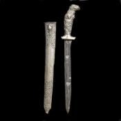 A Javanese dagger pedang lurus c.1900. Slightly swollen SE blade 21cms with striking pamor, silver