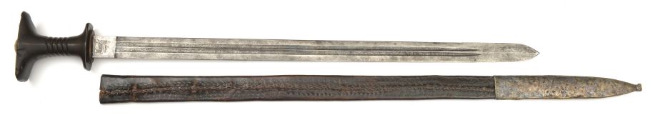 An Ethiopian sword shotel. early 20th century, broad straight DE Liegeoise blade 80cms cut with 2