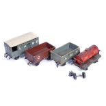 4 Bassett-Lowke Gauge One wagons of wooden construction. An LNWR guard's van (one axle box and