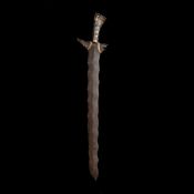 A Sulu datu's short sword kris from the Philippines. 19th century, broad wavy blade 52cms, silver/