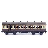 A Bing for Bassett-Lowke Gauge One tinplate GWR bogie coach. Full First class, in lined brown and