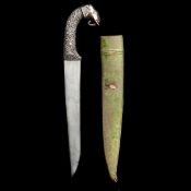 An Indian dagger khanjar. 20th century, broad straight SE blade 26cms, silver hilt embossed with