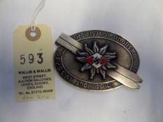 A Third Reich Hitler Youth single sided WM oval plaque, bearing the HJ enamelled badge