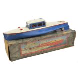 A Hornby Meccano Speed Boat (5). Venture, in red, cream and blue. Together with key and the