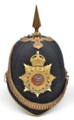 A post-1902 officer’s blue cloth spiked helmet of The Queen’s (Royal West Surrey Regiment), brass