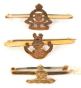 3 9 ct gold sweetheart tie pins: R Artillery, L.N. Lancs Regt and RAOC. GC