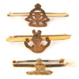 3 9 ct gold sweetheart tie pins: R Artillery, L.N. Lancs Regt and RAOC. GC