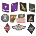 12 items of Third Reich cloth insignia, including Luftwaffe white on grey/blue flying technical
