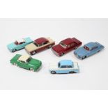 6 Dinky Toys. Humber Hawk in cream and maroon, Vauxhall Victor 101 in metallic red, Triumph Herald