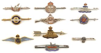 8 sweetheart tie pins, mostly enamelled: “silver” RN, RA plain, badge on arrow, and gilt and