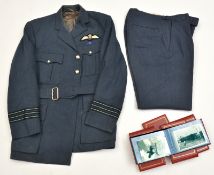 An ERII RAF Wing Commanders greatcoat, tunic with Pilots wings, General Service medal ribbon, and