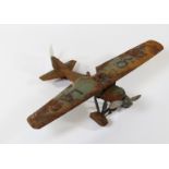 A scarce Tipp & Co. tinplate German aircraft. A late 1930's monoplane light bomber with wind-up