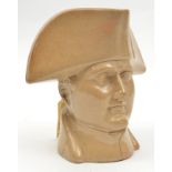 A salt glazed stoneware Napoleon jug, c 1840, the Emperor, head and collar, wearing tricorne hat,