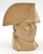 A salt glazed stoneware Napoleon jug, c 1840, the Emperor, head and collar, wearing tricorne hat,