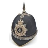 A good pre 1908 officer’s blue cloth spiked helmet of the Cinque Ports Volunteer Battalion The Royal