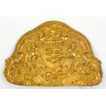 A die-struck gilt brass centre from a rayed helmet plate, c 1840, of the Madras Horse Artillery,