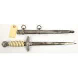 A Third Reich 2nd pattern Luftwaffe officers’ dagger, in its scabbard. QGC (the blade and hilt