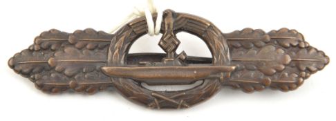 A Third Reich U boat clasp in bronze, 2nd Schwerin type with flat back and pin with central ridge.