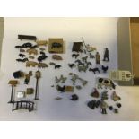 A quantity of Britains etc farm animals, figures and accessories. Pigs, piglets, sheep, lambs,
