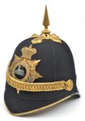 A Victorian officer’s blue cloth spiked helmet of The South Staffordshire Regiment, brass peak