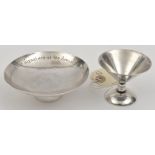A Third Reich silver coloured schnapps cup, stamped with Luftwaffe eagle over “Celle”, the base