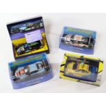 4 2000's issue Scalextric slot racing cars. Aston Martin DBR9 (C2965) in weathered light blue,