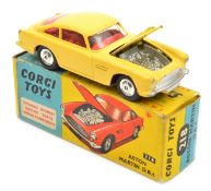 Corgi Toys Aston Martin D.B.4 (218). In bright yellow with red interior, spun wheels example with