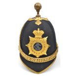 A good Victorian officer’s blue cloth ball topped helmet of the Army Service Corps, gilt peak