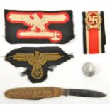 A German pen knife, the brass sideplate embossed on one side with a figure of Hitler, and on the