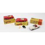 3 Dinky Toys. Austin Healey Sprite (112) in bright red with cream seats. An M.G.B. Sports Car (
