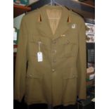 A WWII Polish armoured unit officer’s khaki 4 pocket tunic, the epaulettes with 3 silver bullion