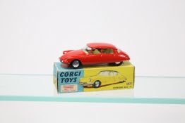 Corgi Toys Citroen D.S.19 (210S). In bright red with yellow interior, smooth wheels with black