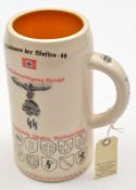 A Third Reich 1½ litre SS glazed pottery beerstein, embossed with eagle and skull with SS runes