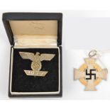 A Third Reich 1939 bar to the 1914 Ist class Iron Cross, of plated brass, in its box (plating and