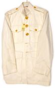 A US Marine Corps white tropical jacket, gilt buttons with pair overalls, maker’s labels with