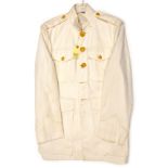 A US Marine Corps white tropical jacket, gilt buttons with pair overalls, maker’s labels with