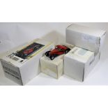 4 Franklin Mint 1:24 scale models. 1928 Stutz Black Hawk Boat tail Roadster in red and black. 1968