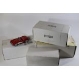 4 Franklin Mint 1:24 scale models. 1957 Chevrolet Bel Air in red with cream roof, red/black