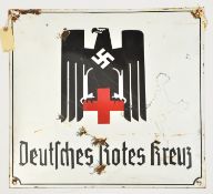 A rectangular white enamelled wall plaque, 20” x 20”, bearing Third Reich Red Cross eagle above “