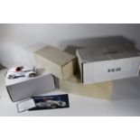 4 Franklin Mint 1:24 scale models. A 1935 Auburn 851 Speedster in in white with red interior and