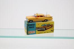 Corgi Toys Chevrolet New York Taxi Cab (221). Example in all over yellow with red interior, aerial