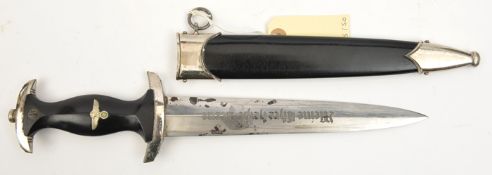 A Third Reich 1933 Model SS dagger, the blade bearing RZM mark over “41/37/SS” and post 1941