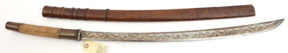 A 19th century Burmese sword dha, slightly curved, SE blade 23½”, swollen towards point, the shallow