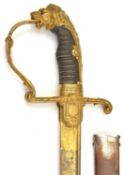 An Imperial German officer’s dress sword, curved, pipe backed blade 32”, double edged at point,