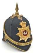 A Victorian officer’s blue cloth spiked helmet of The King’s Own (Royal Lancaster Regiment), brass