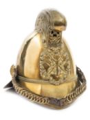 A fire officer’s brass Merryweather pattern helmet, with front peak and large back peak, comb