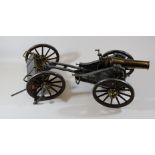 A model of the Spanish 'Mortero 1895' field gun with limber. A Spanish made model of steel and brass