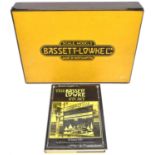 A useful box for a Bassett-Lowke O gauge train set. A yellow and brown card box with hinged lid