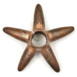 A scarce star-shaped copper mace head. Probably pre-Columbian, Inca c.1200-1532AD cast with 5 points