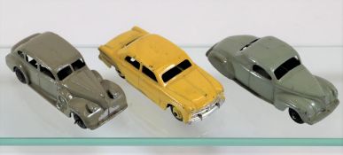 3 Dinky Toys. 39c, Lincoln Zephyr with grey body and black wheels. 39d, Buick with beige body and